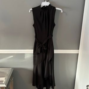 High low black dress, belt around the waist
